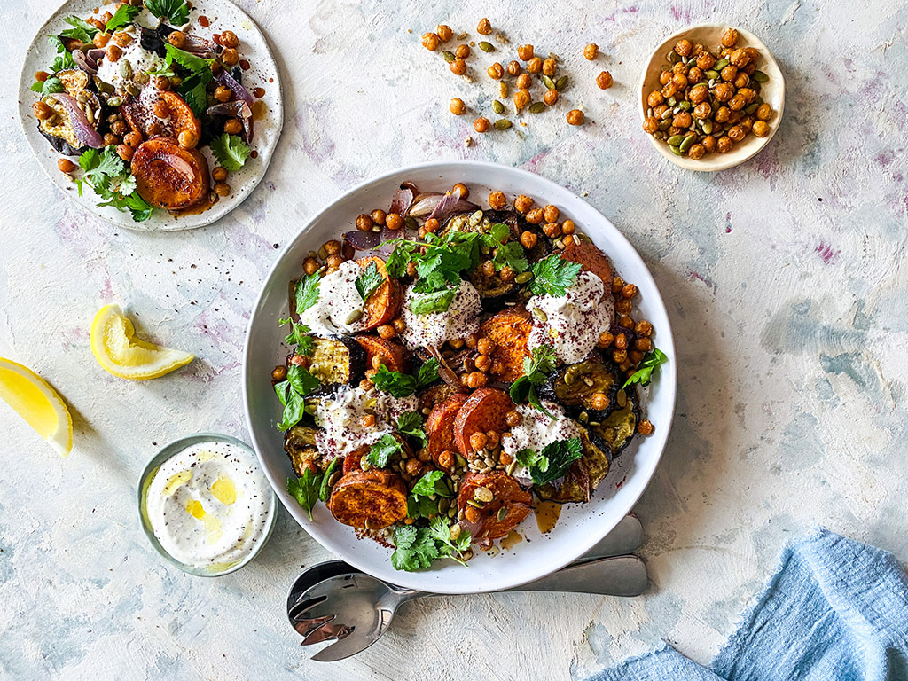 Tray roast eggplant & sweet potato with crispy chickpeas & spiced yoghurt